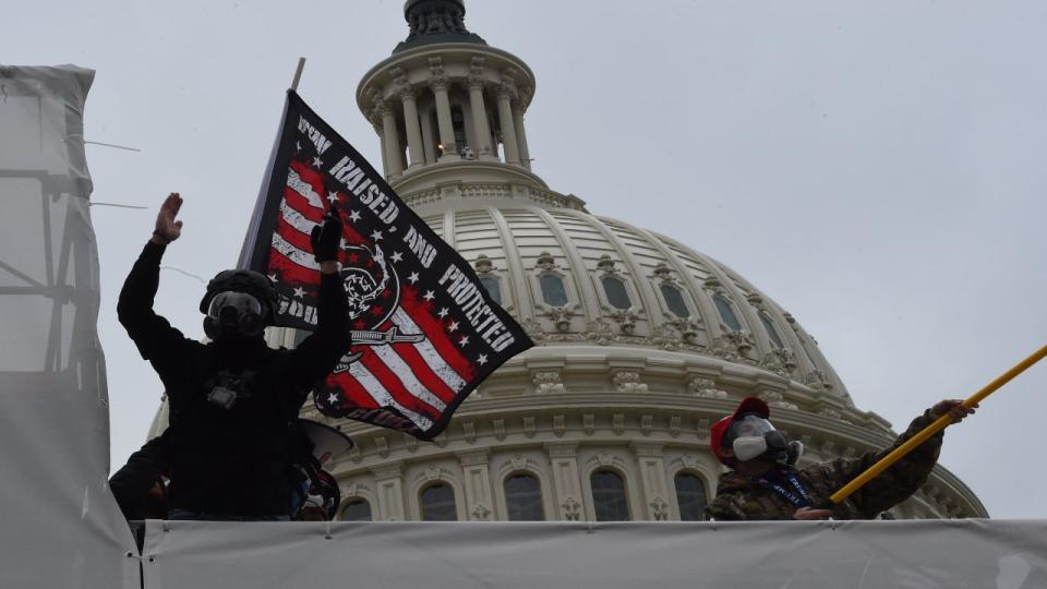 Supporters of US President Donald Trump protest outside the US Capitol on January 6, 2021, in Washington, DC. - Demonstrators breeched security and entered the Capitol as Congress debated the a 2020 presidential election Electoral Vote Certification.