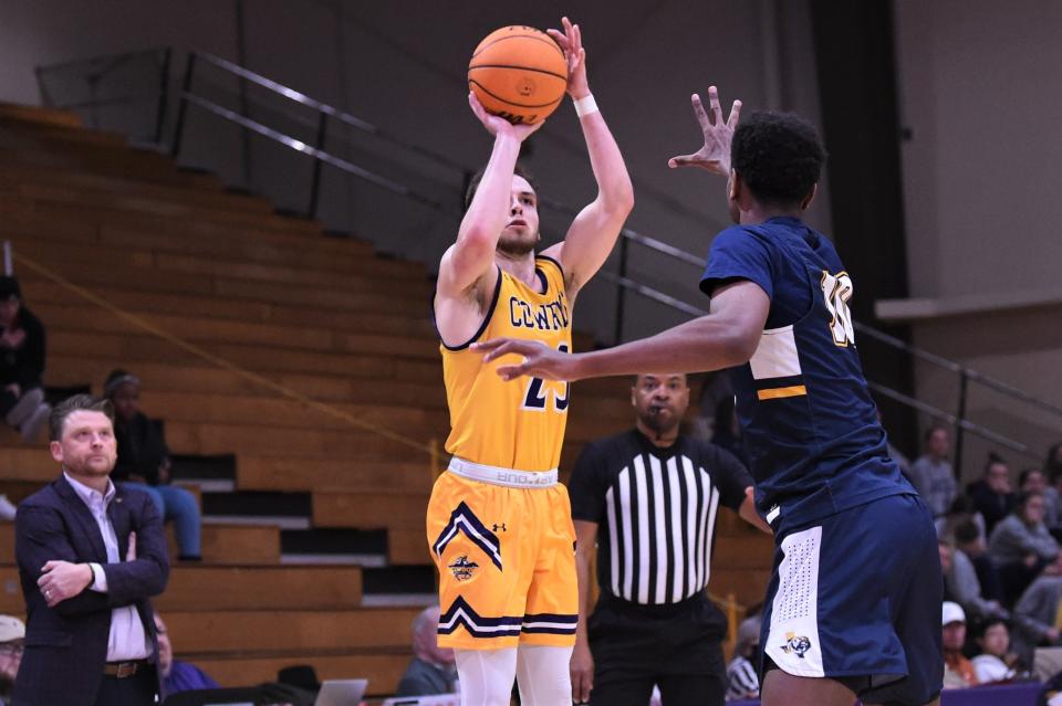 Hardin-Simmons' Chase Cobb (23) shoots a 3-pointer during Thursday's American Southwest Conference game against East Texas Baptist.