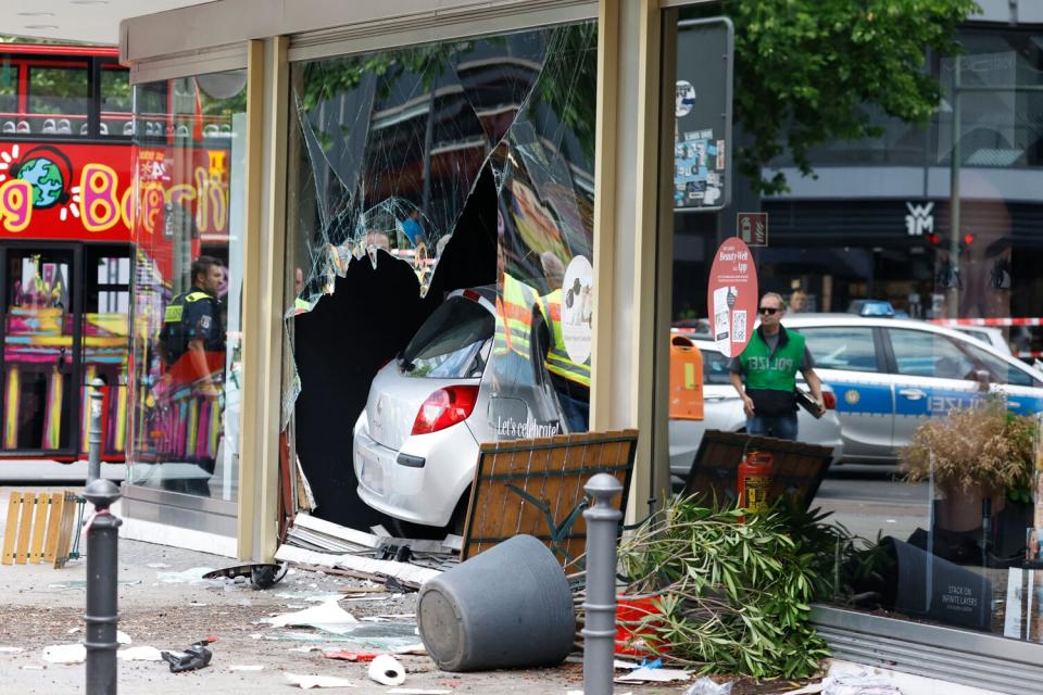 The car that was droven into a group of people killing one person and injuring eight injured is pictured in central Berlin,