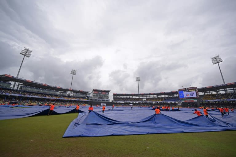 The team of groundstaff who raced out with covers each time rain halted play have been hailed as the unsung heroes of the Asia Cup (Ishara S. KODIKARA)