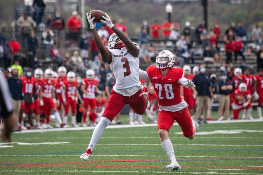 Sacred Heart's Naseim Brantley catches a fourth-quarter touchdown pass against Duquesne in a Northeast Conference game on April 10, 2021.