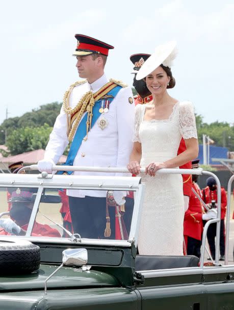 PHOTO: Prince William, Duke of Cambridge and Catherine, Duchess of Cambridge smile as they attend the inaugural Commissioning Parade for service personnel from across the Caribbean, March 24, 2022, in Kingston, Jamaica. (Chris Jackson/Getty Images)