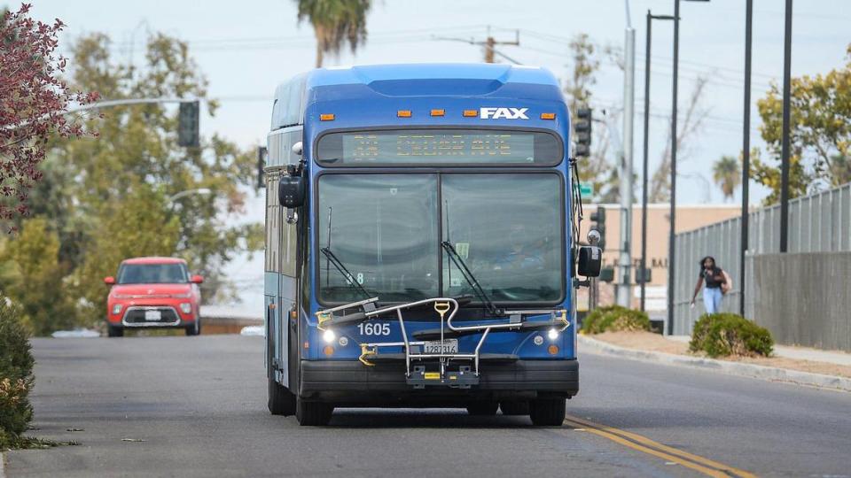 A FAX bus drives down South Walnut Avenue between the West Fresno Branch Library and Edison High School on Wednesday, Oct. 20, 2021.