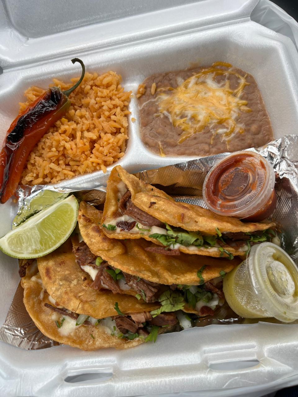Birria tacos from Fayetteville Taco Madness winner Taco Arepa, a food truck typically parked at 6474 Yadkin Road.