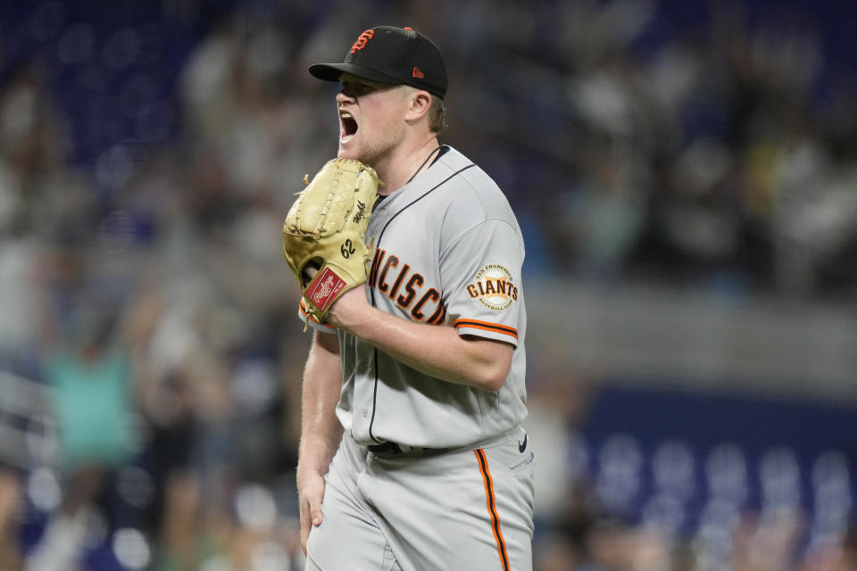 San Francisco Giants starting pitcher Logan Webb reacts after giving up a two-run home run to Miami Marlins' Jorge Soler during the seventh inning of a baseball game, Monday, April 17, 2023, in Miami. (AP Photo/Lynne Sladky)