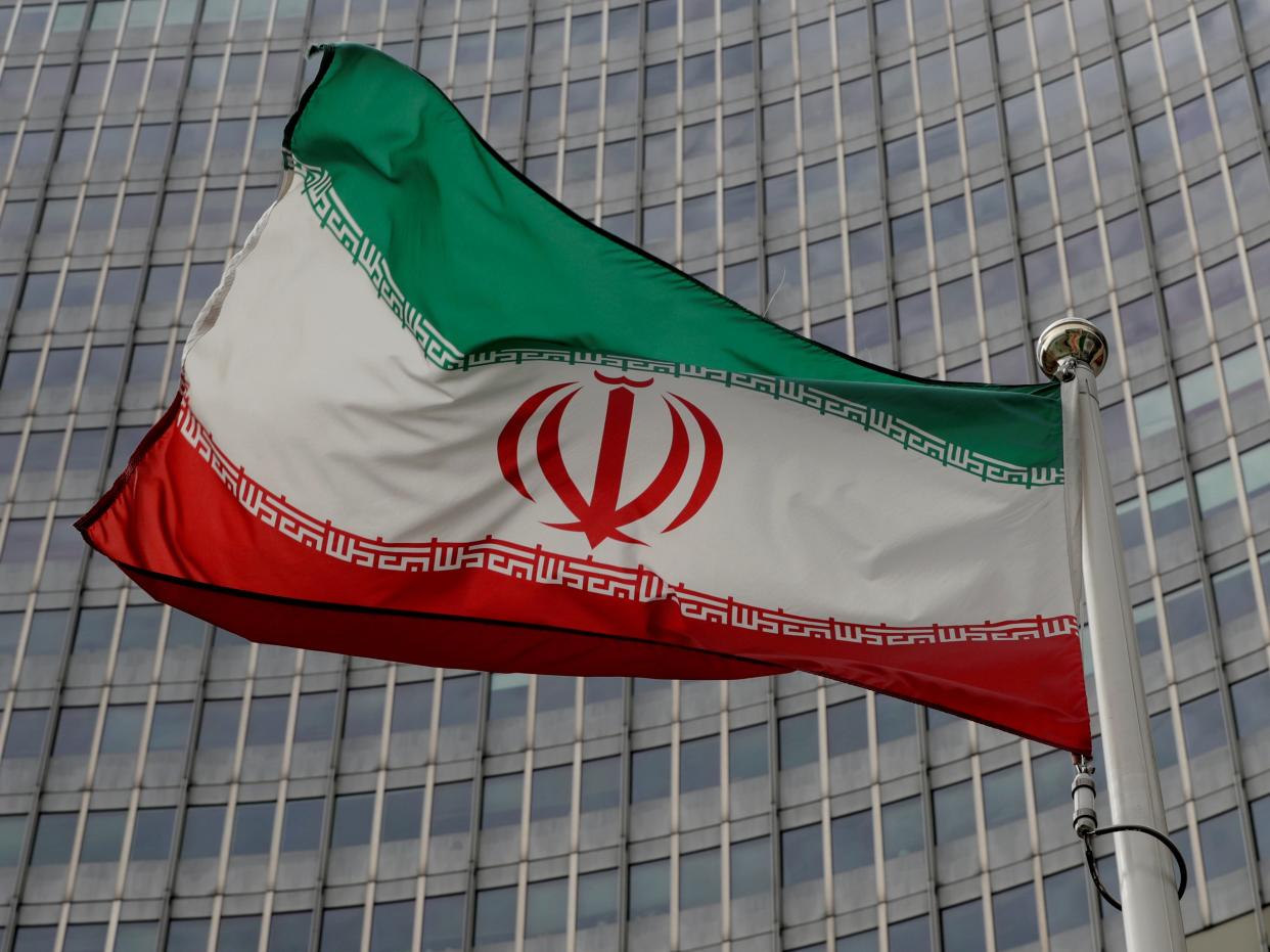 <p>An Iranian flag at the International Atomic Energy Agency (IAEA) headquarters in Vienna, Austria</p> (Reuters)