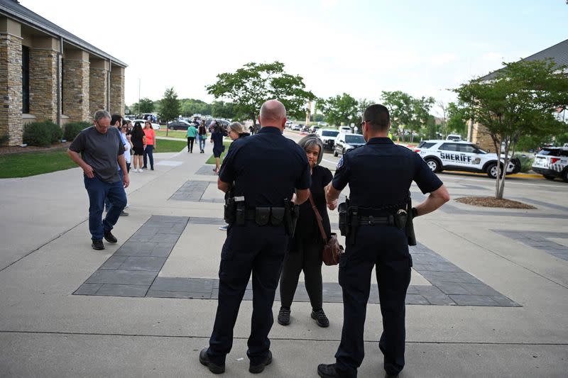 FILE PHOTO: Day after a gunman shot multiple people at the Allen Premium Outlets mall