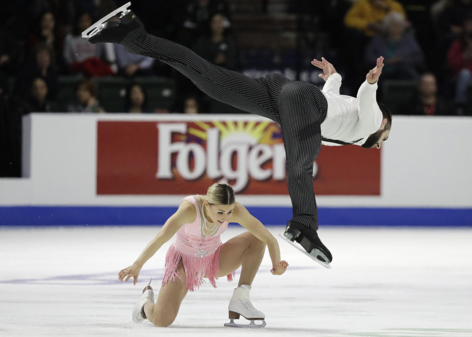 Ashley Cain and Timothy Leduc perform during the pairs short program at Skate America, Friday, Oct. 19, 2018, in Everett, Wash. (AP Photo/Ted S. Warren)