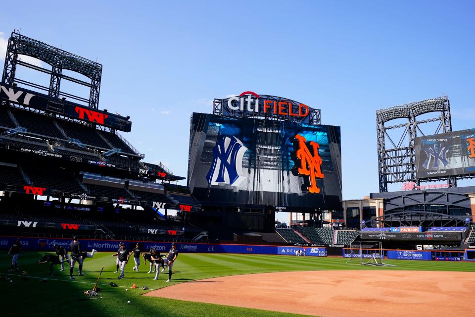 The New York Yankees warm up before a baseball game against the New York Mets at Citi Field on Tuesday, June 13, 2023, in New York. (AP Photo/Frank Franklin II)