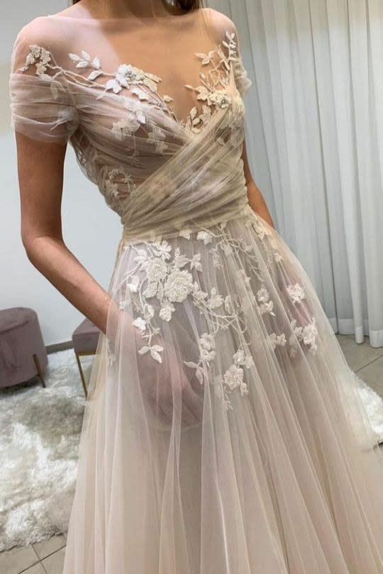 Wedding gown see-through divides fans