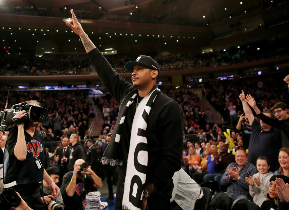 Carmelo Anthony received a standing ovation in his return to Madison Square Garden on Sunday. (Elsa/Getty Images)