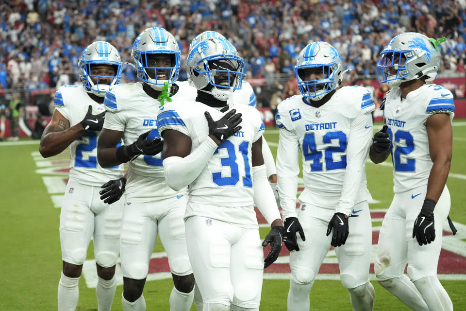 Detroit Lions safety Kerby Joseph (31) reacts to his interception of a Arizona Cardinals quarterback Kyler Murray pass during the second half of an NFL football game Sunday, Sept. 22, 2024, in Glendale, Ariz. (AP Photo/Ross D. Franklin)