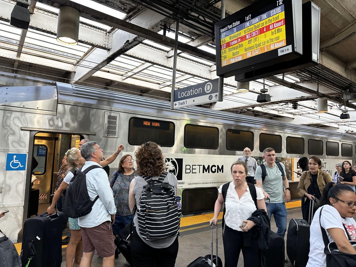 NJ Transit and Amtrak riders suffered extreme heat and long delays at Newark Penn Station Thursday after a power outage hit Amtrak's Northeast Corridor line between Philadelphia and New Haven, Connecticut.