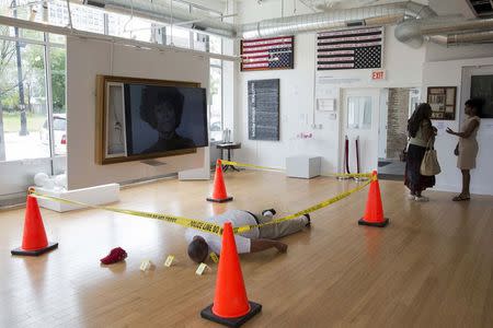 An art installation depicting the body of Michael Brown, made by artist Ti-Rock Moore, currently exhibited at Gallery Guichard in Chicago, Illinois, July 14, 2015. REUTERS/Andrew Nelles