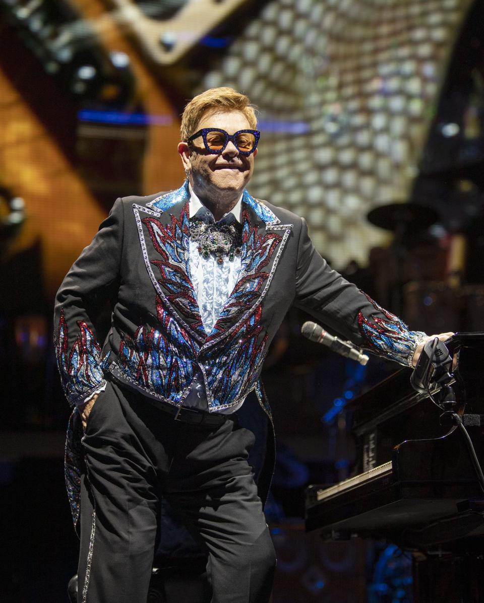Elton John stands and looks out at the audience as he performs at Vivint Arena in Salt Lake City on Wednesday, Sept. 4, 2019. | Scott G Winterton