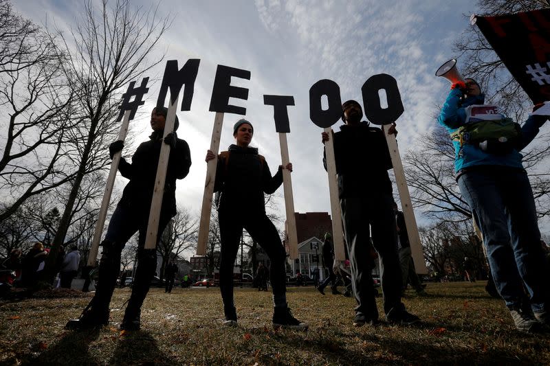 FILE PHOTO: Demonstrators spell out "#METOO" during the local second annual Women's March in Cambridge