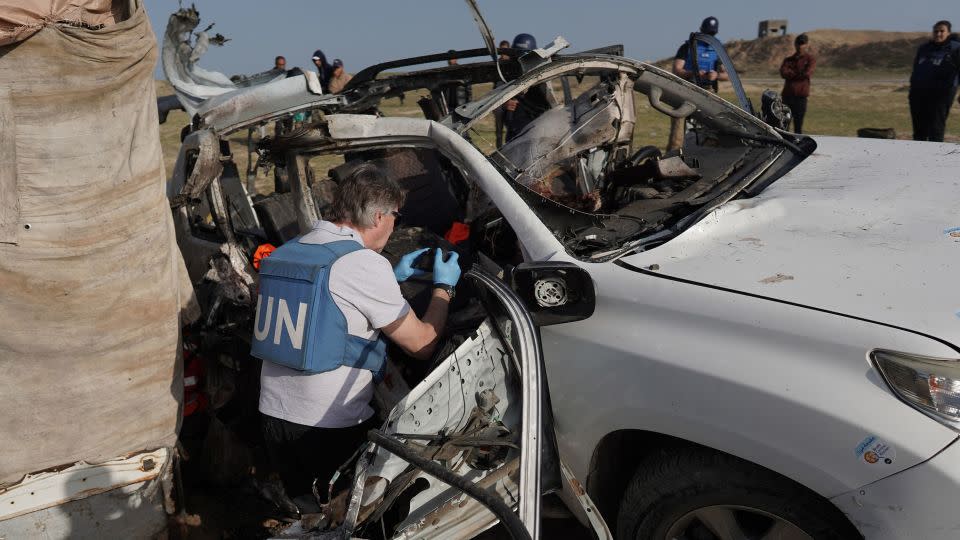 CNN geolocated the third car, seen with its roof blown apart, to an open field 1.6 km from the second car. - AFP/Getty Images