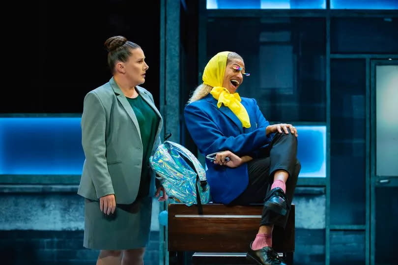 Sam Bailey as Miss Hedge and Ivano Turco as Jamie New in a scene from Everybody's Talking About Jamie