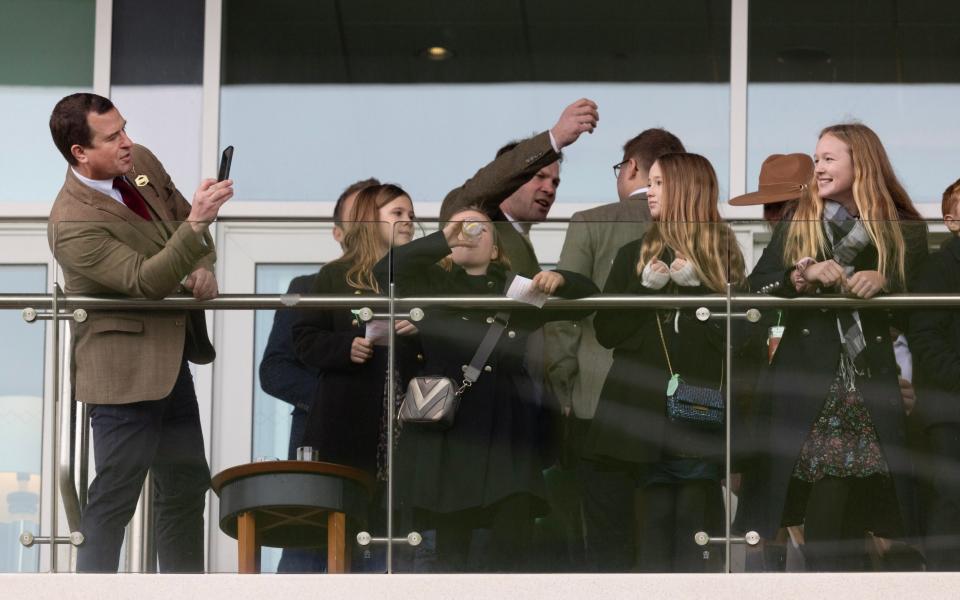 The families gathered together to watch the horse racing