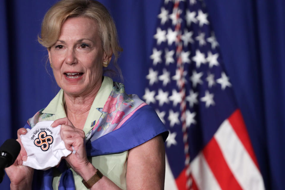 White House coronavirus response coordinator Deborah Birx holds up a mask as she speaks during a White House Coronavirus Task Force press briefing at the U.S. Department of Education July 8, 2020 in Washington, DC. (Alex Wong/Getty Images)