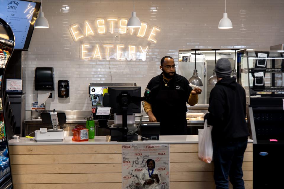 Donte Mason serves a customer on Jan. 31 at the Eastside Eatery at The Market at EastPoint in Oklahoma City.