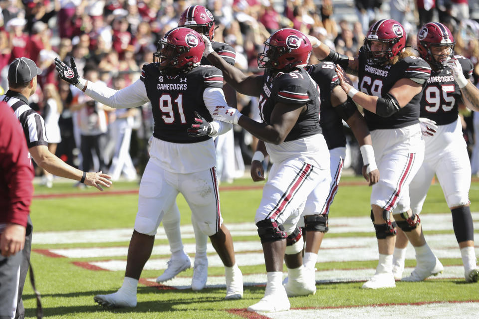 South Carolina defensive tackle Tonka Hemingway (91) celebrates a 2-yard touchdown run during the first half of an NCAA college football game against Jacksonville State on Saturday, Nov. 4, 2023, in Columbia, S.C. (AP Photo/Artie Walker Jr.)