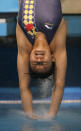 "Why don't they heat this pool?" China's He Zi breaks into the water to win the gold medal in the women's 1-metre springboard diving competition at the World Aquatic Championships in Melbourne March 23, 2007. REUTERS/Wolfgang Rattay