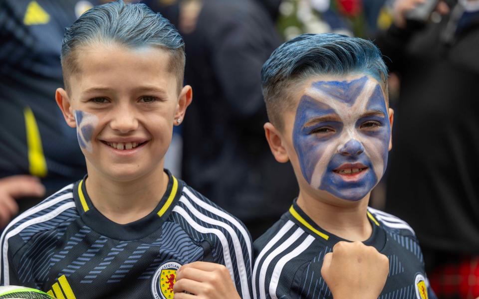 Scotland fans with saltire face paint