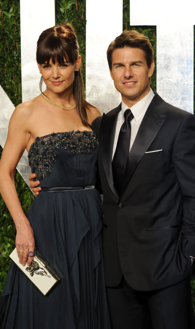 WEST HOLLYWOOD, CA – FEBRUARY 26: Actors Katie Holmes and Tom Cruise arrive at the 2012 Vanity Fair Oscar Party hosted by Graydon Carter at Sunset Tower on February 26, 2012 in West Hollywood, California. <em>Photo by Mark Sullivan/WireImage.</em>