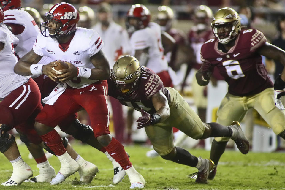 Jacksonville State quarterback Zerrick Cooper (6) is sacked by Florida State defensive end Jermaine Johnson II (11) in the second quarter of an NCAA college football game Saturday, Sept. 11, 2021, in Tallahassee, Fla. (AP Photo/Phil Sears)