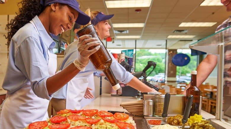 Jersey Mike's workers making sandwiches