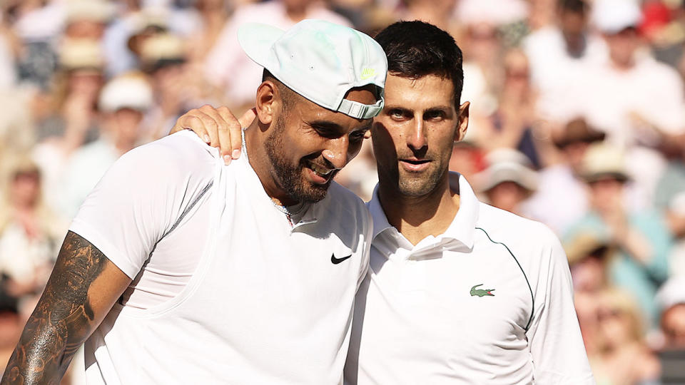 From left to right, Nick Kyrgios and Novak Djokovic embrace after the Wimbledon final in 2022.