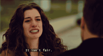 Anne Hathaway cries as she says, "It isn't fair" while talking to Jake Gyllenhaal in the film 'Love & Other Drugs'