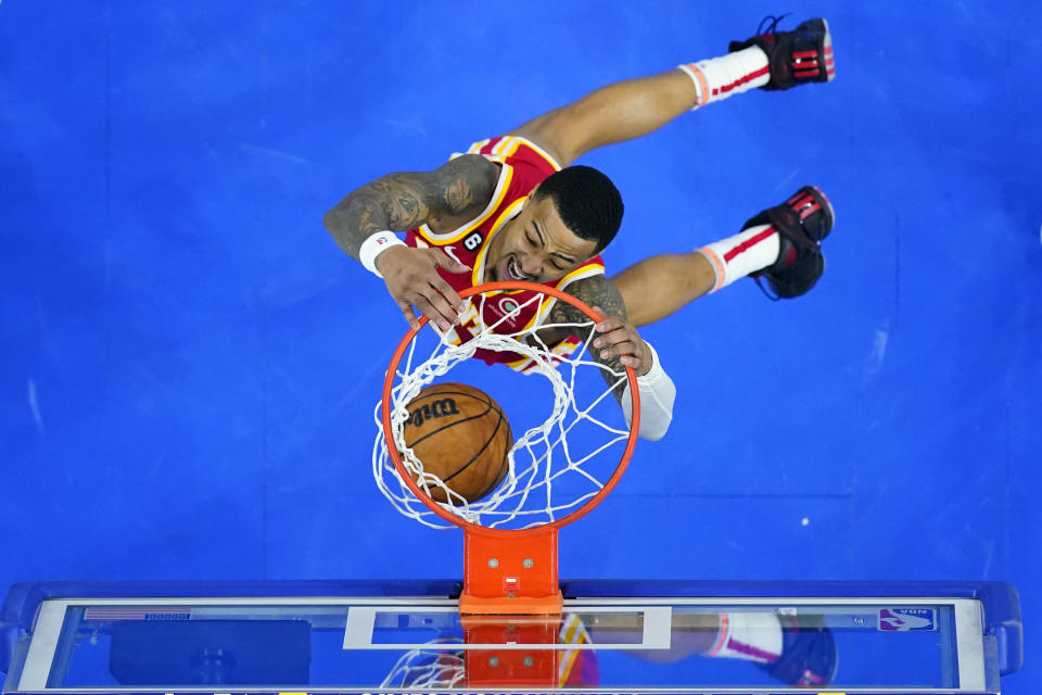 Atlanta Hawks' John Collins dunks during the second half of an NBA basketball game against the Philadelphia 76ers, Monday, Nov. 28, 2022, in Philadelphia. (AP Photo/Matt Slocum)