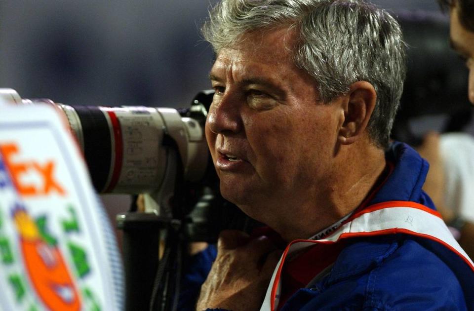 1/03/02 the 68th Annual FedEx Orange Bowl-Miami Herald Staff photo by WALTER MICHOT Sen. Bob Graham shooting the Orange Bowl game as one of his work days. He is shooting for the Palm Beach Post WALTER MICHOT/HERALD STAFF