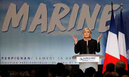 Marine Le Pen, French National Front (FN) political party leader and candidate for French 2017 presidential election, attends a political rally in Perpignan, France, April 15, 2017. REUTERS/Jean-Paul Pelissier