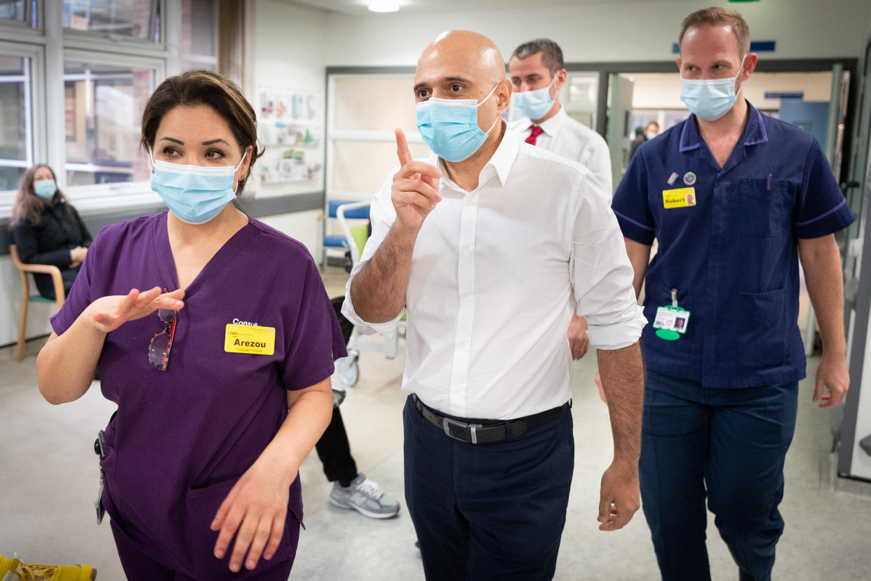 Health secretary, Sajid Javid visits St George's Hospital in south west London where he talked to staff and met Covid 19 patients who are being treated with a new anti-viral drug. The coronavirus booster programme continues across the UK with the government's aim to offer everyone a booster jab by the end of the year. Picture date: Wednesday December 22, 2021. (Photo by Stefan Rousseau/PA Images via Getty Images)