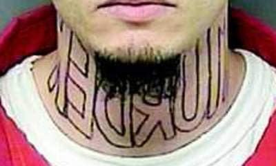 Murder tattoo prison mugshot