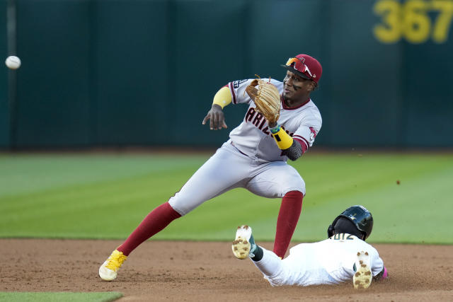 Perdomo, Gurriel hit 2-run homers as Diamondbacks win 4th straight, beat  A's 5-2 behind Kelly