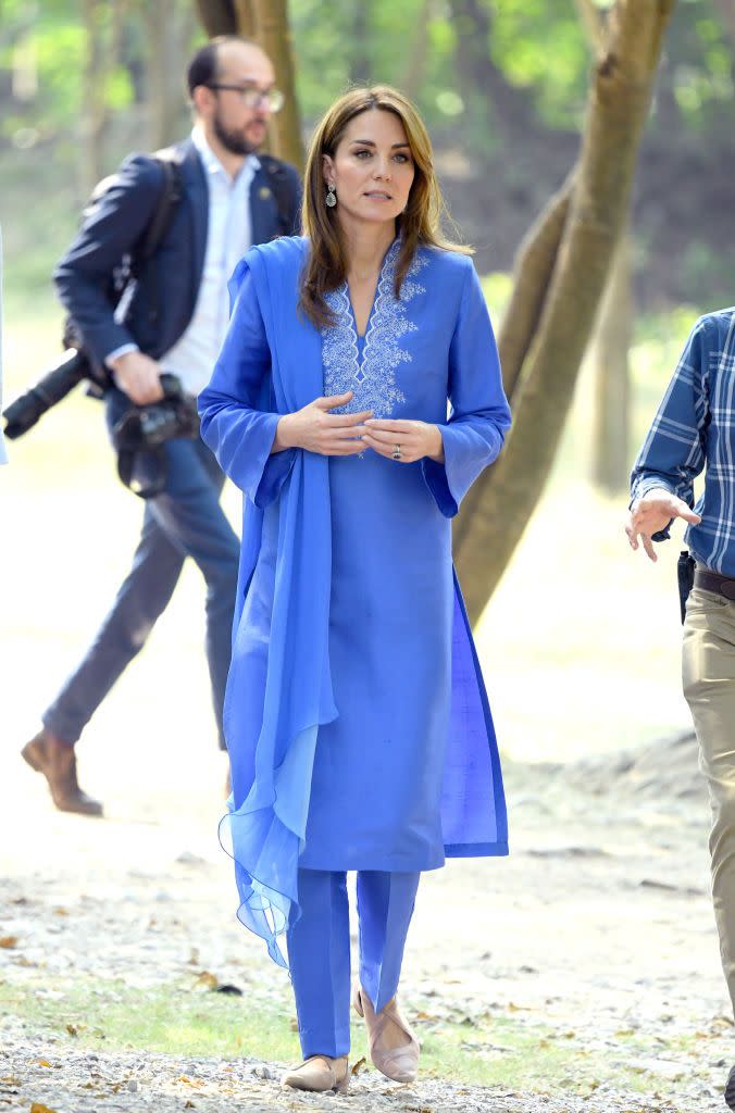 <p>For her first full day of engagements in Pakistan, Kate wore a vibrant periwinkle kurta by a. local designer. <a href="https://www.townandcountrymag.com/society/tradition/a29443456/kate-middleton-blue-kurta-maheen-khan-pakistan-photos/" rel="nofollow noopener" target="_blank" data-ylk="slk:Get all the details here.;elm:context_link;itc:0;sec:content-canvas" class="link ">Get all the details here. </a></p>