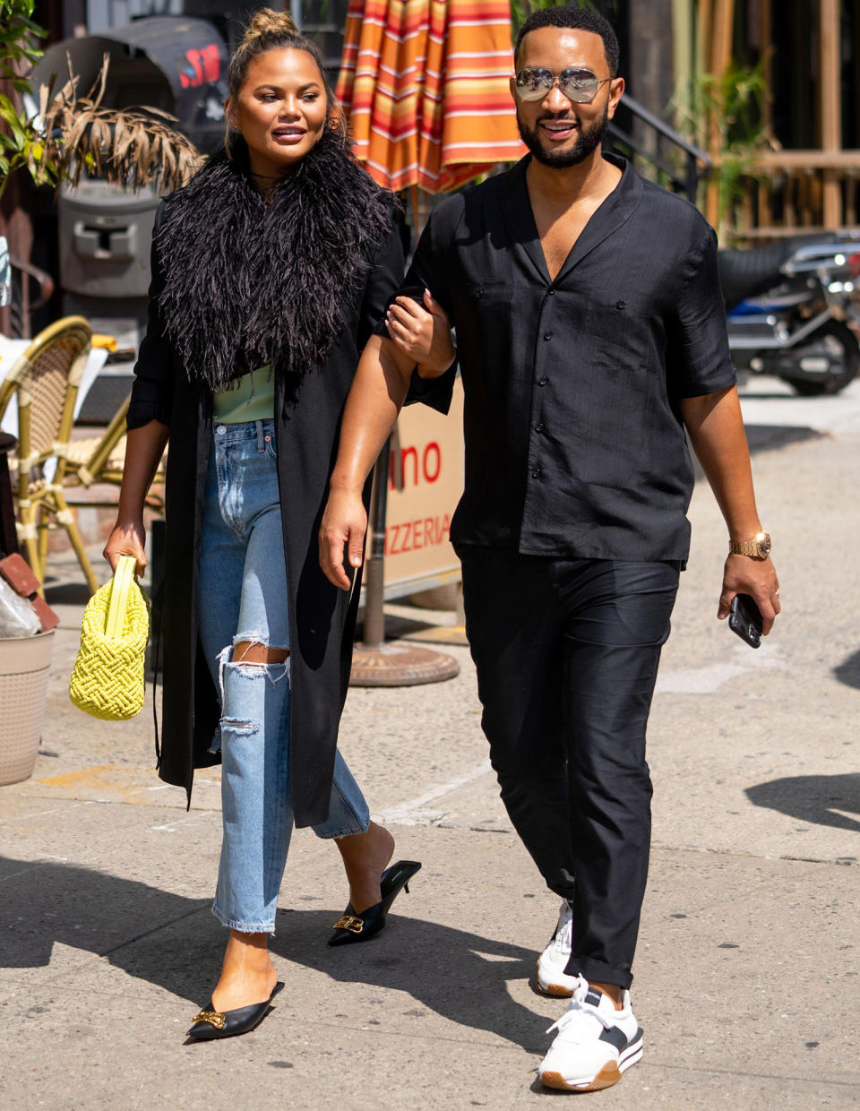 <p>Chrissy Teigen and John Legend enjoy a sunny SoHo stroll in New York City.</p>