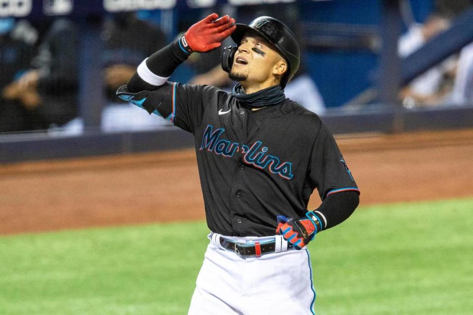 Miami Marlins infielder Isan Diaz (1) reacts after hitting a grand slam during the third inning of an MLB game against the Milwaukee Brewers at loanDepot park in the Little Havana neighborhood of Miami, Florida, on Friday, May 7, 2021.