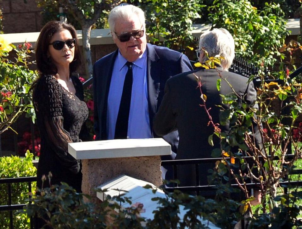 Catherine Zeta-Jones, Joel Douglas and Michael Douglas | London Entertainment / Splash