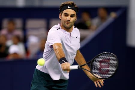 Tennis - Shanghai Masters tennis tournament - Finals - Shanghai, China - October 15, 2017 - Roger Federer of Switzerland in action against Rafael Nadal of Spain. REUTERS/Aly Song