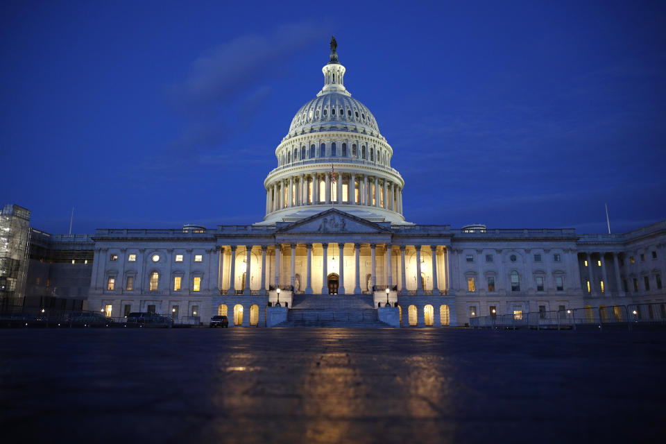 FILE - In this Dec. 4, 2019, file photo, fight shines on the U.S. Capitol dome in Washington. The votes are there. The rules and choreography are set, more or less. And now — hear ye, hear ye — the Senate impeachment trial of President Donald Trump is nearly set to begin. Here's what to expect when the Senate puts the impeachment articles against Trump on trial, starting as early as this coming week. (AP Photo/Patrick Semansky, File)