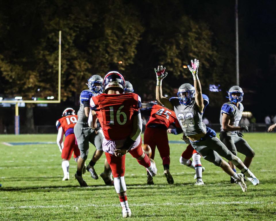 Falcon Roman Brummel (23) lays out to try and block a punt by Emanuel Mason (16). The Lebanon Cedars played host to the Cedar Crest Falcons in the 50th Annual Cedar Bowl, Friday October 28, 2022 at Alumni Stadium. Cedar Crest won the game, 47-0.