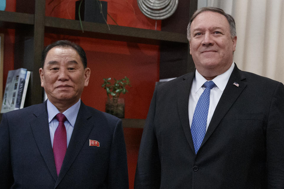 Secretary of State Mike Pompeo, right, and Kim Yong Chol, a North Korean senior ruling party official and former intelligence chief, pose for photographs at the The Dupont Circle Hotel in Washington, Friday, Jan. 18, 2019. (AP Photo/Carolyn Kaster)