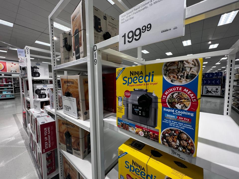 A display of air-fryers with spider wraps at Target.