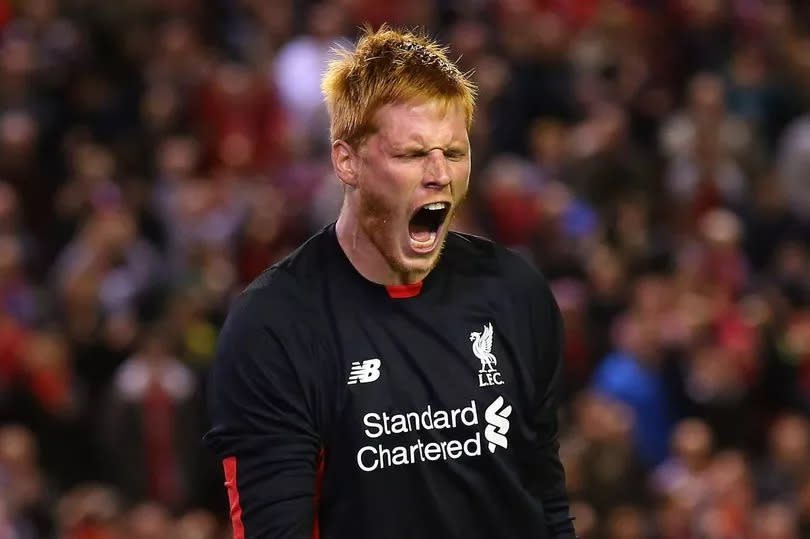 Adam Bogdan of Liverpool celebrates after saving a penalty from Danny Grainger of Carlisle United during a penalty shoot out in the Capital One Cup Third Round match between Liverpool and Carlisle United at Anfield on September 23, 2015 in Liverpool, England