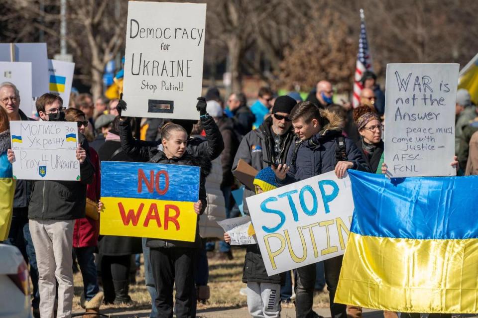 Many Kansas Citians gathered to show solidarity with Ukraine at The Plaza on Saturday, Feb. 26, 2022. The demonstration was held in response to the recent military invasion by Russia.